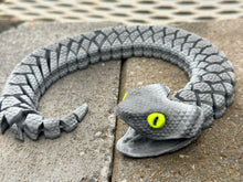 Grey articulated snake