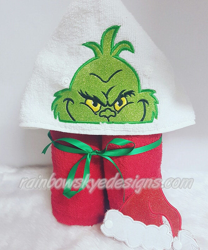 the Grinch and lady hooded towel