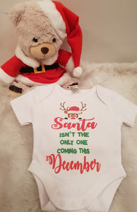 Santa isnt the only one coming Baby announcement