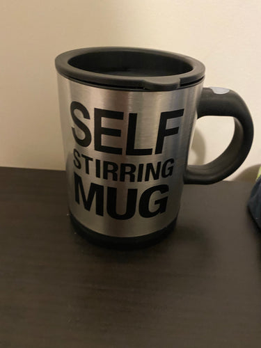 Self stirring mug